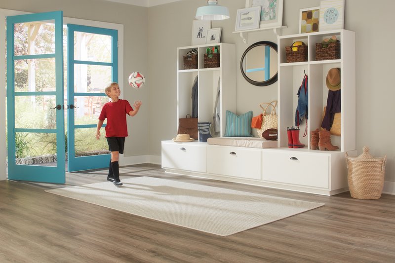 boy playing in livingroom